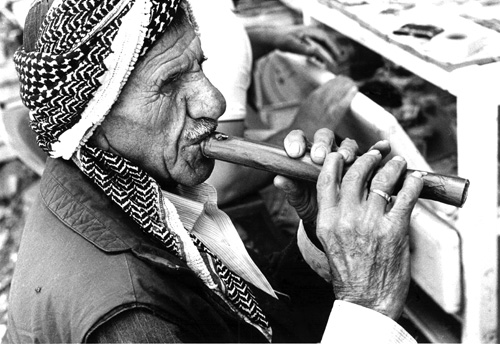 flute player in Iraq